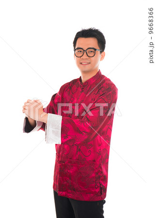 Asian man with Chinese traditional dress cheongsam and gong xi f 9668366