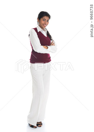 casual indian female in sweater crossed arm 9668738