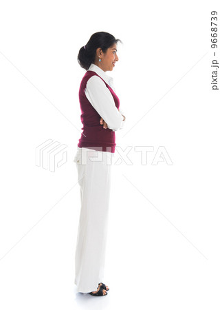 casual indian female in sweater side view casual indian female in sweater side view 9668739