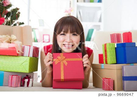 asian girl christmas celebration at her home 9669047