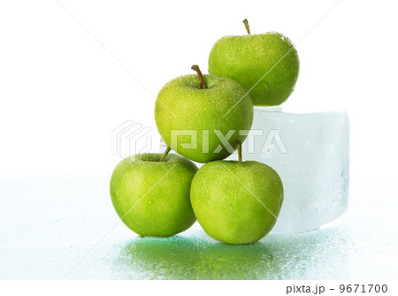 Green apples on ice cube 9671700