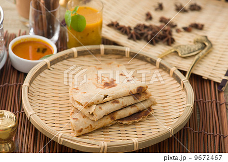 Indian flat-bread called Chapati with vegetable curry 9672467