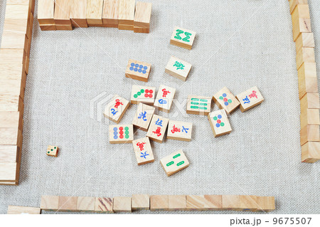playing mahjong board game on textile table playing mahjong board game on textile table 9675507