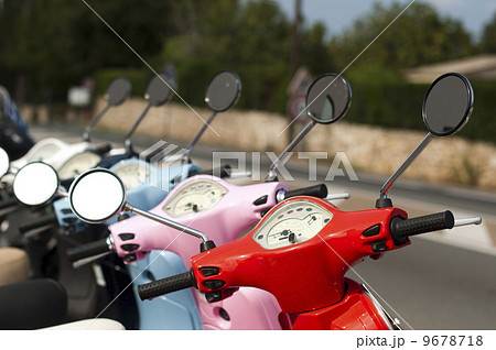 A line of mopeds/scooters A line of mopeds/scooters 9678718