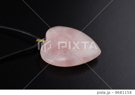 Rose quartz heart with leather string on black Rose quartz heart with leather string on black 9681158