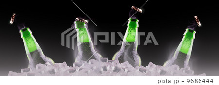 open wet beer bottles on ice 9686444