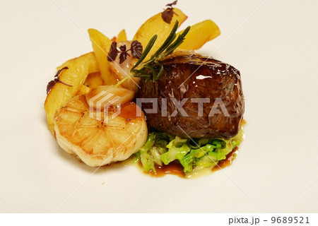 Meat with french fries and vegetables 9689521