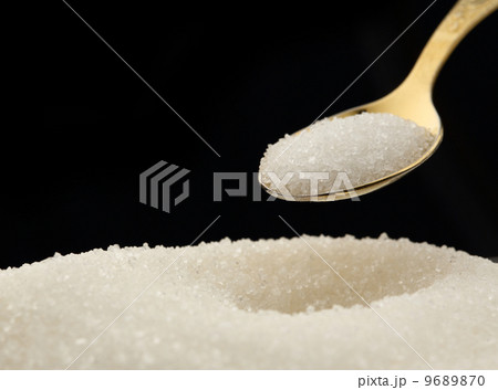 White sugar and spoon White sugar and spoon 9689870