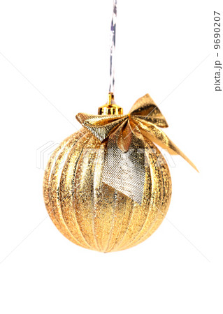 Golden christmas ball with ribbon. Golden christmas ball with ribbon. 9690207