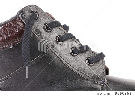 Shoelaces on boot close up and space for text. Shoelaces on boot close up and space for text. 9690362