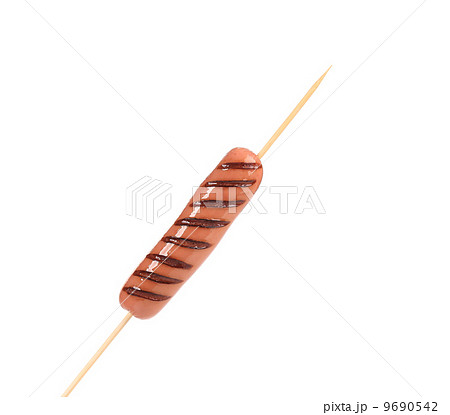 Sausage roll grilled on stick. Sausage roll grilled on stick. 9690542