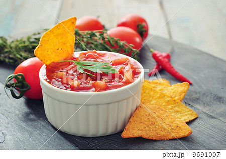 Bowl of salsa with tortilla chips Bowl of salsa with tortilla chips 9691007
