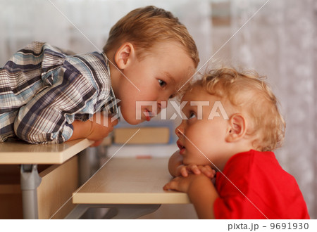 Cute siblings. Two little brothers. 9691930