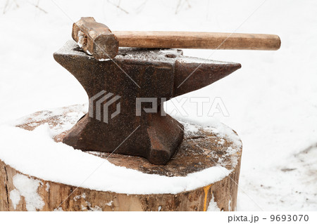 anvil with hammer in old abandoned village smithy anvil with hammer in old abandoned village smithy 9693070