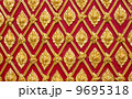 Golden Pattern of Thai art on wall of Wat Phra That Doi Suthep i 9695318