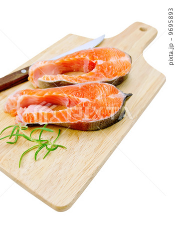 Trout with a knife and rosemary Trout with a knife and rosemary 9695893