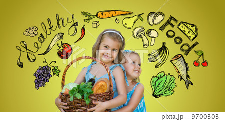 Two little girls holding basket of organic food Two little girls holding basket of organic food 9700303