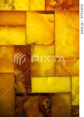 Closeup of golden amber mosaic as background or texture. Gem. Closeup of golden amber mosaic as background or texture. Gem. 9701856
