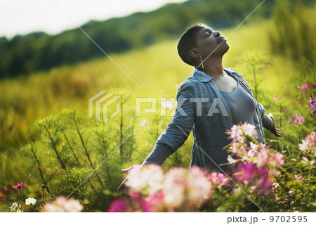 Woman Enjoying Organic Flower Farm Woman Enjoying Organic Flower Farm 9702595