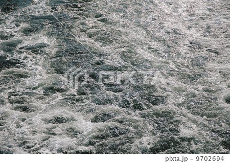 Wake from a passenger ferry on the water, near Seattle. 9702694