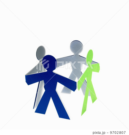 Papercuts, paper cut out figures representing people with joined hands. Papercuts, paper cut out figures representing people with joined hands. 9702807
