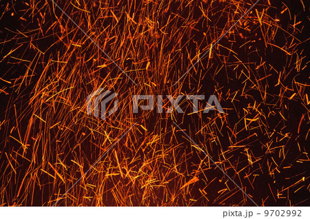 Sparks rising from a bonfire in Bonny Doon, Monterey Bay, California, USA. 9702992