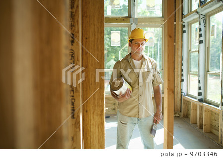 A construction site, a domestic house being built in a rural setting in New York State, USA A construction site, a domestic house being built in a rural setting in New York State, USA 9703346