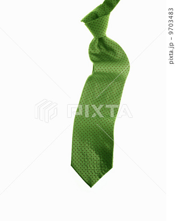 A knotted green fabric tie, or necktie. A knotted green fabric tie, or necktie. 9703483