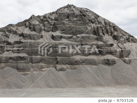 Large heap of gravel and stone used for road construction 9703526
