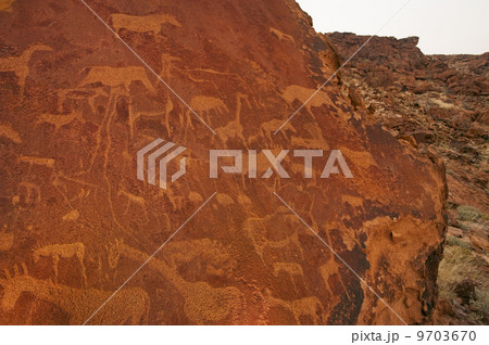 Rock art engravings at Twyfelfontein World Heritage Site at Uibasen Conservancy, Damaraland, Namibia 9703670