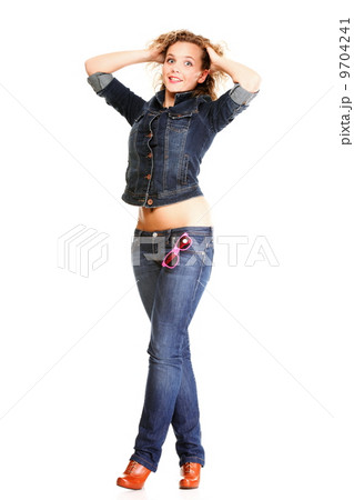 Beautiful young woman blonde standing full body in jeans isolate Beautiful young woman blonde standing full body in jeans isolate 9704241