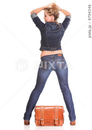 Beautiful young woman blonde standing full body in jeans isolate Beautiful young woman blonde standing full body in jeans isolate 9704346