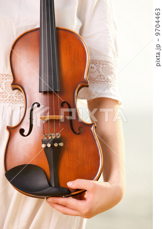 Female hand with a violin outdoor 9704463
