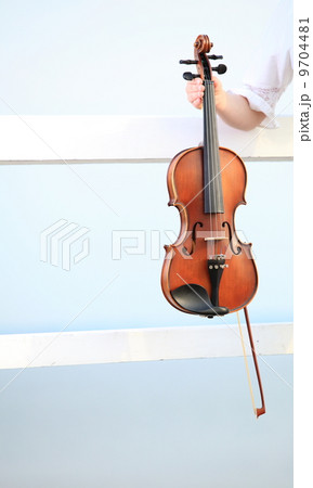 Female hand with a violin outdoor Female hand with a violin outdoor 9704481