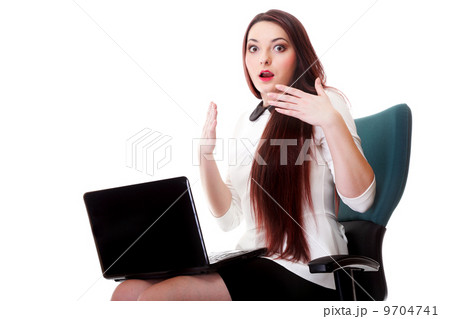 business woman reading bad news at laptop 9704741