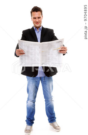 Businessman reading a newspaper isolated 9704895