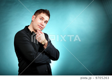 young pensive man with headphones young pensive man with headphones 9705263