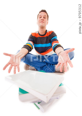 tired college student with stack of books studying for exams isolated 9705312
