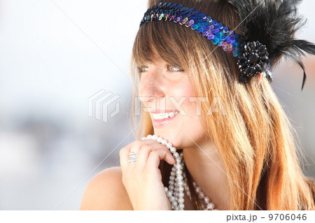Flapper girl .Vintage woman in 1920s style 9706046