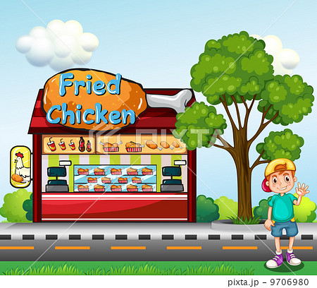 A young boy near the fried chicken store A young boy near the fried chicken store 9706980