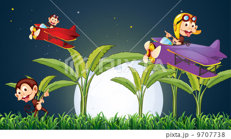 Three playful monkeys playing with the plane under the fullmoon 9707738