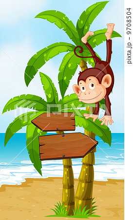 A playful monkey at the beach with an arrowboard A playful monkey at the beach with an arrowboard 9708504