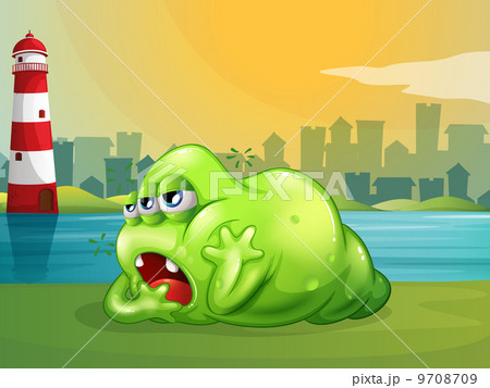 A fat green monster across the lighthouse 9708709