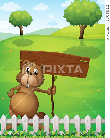 A beaver holding an empty signboard standing near the fence 9708912