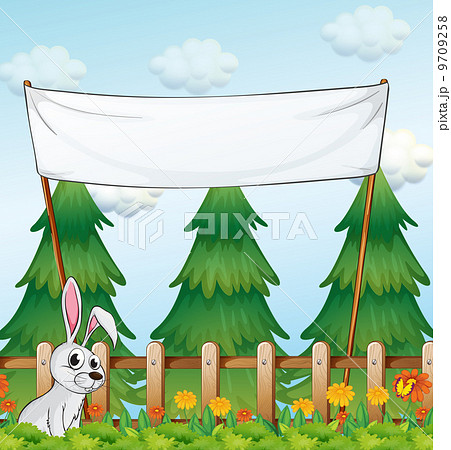 An empty banner near the fence with a rabbit 9709258