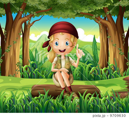 A forest with a young girl sitting above a log A forest with a young girl sitting above a log 9709630