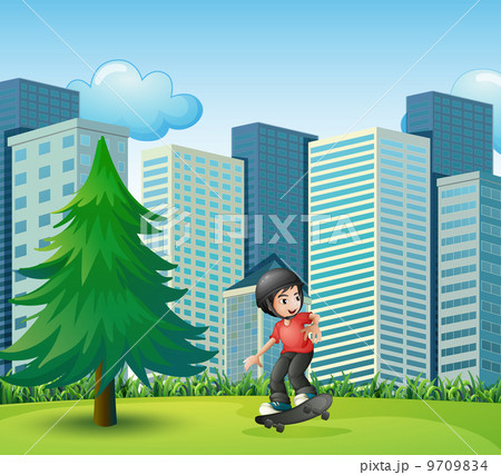 A boy skateboarding near the high buildings 9709834