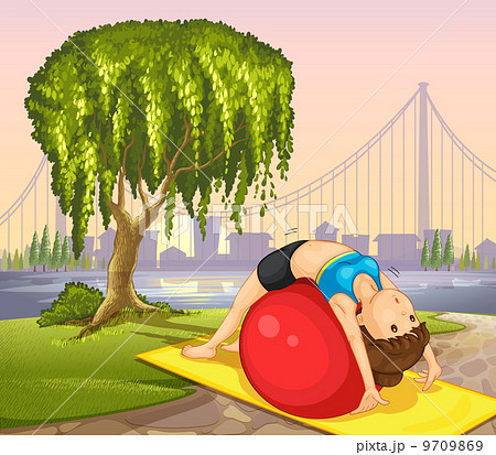 A girl keeping her body fit near the tree A girl keeping her body fit near the tree 9709869