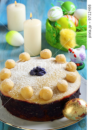 Easter cake and basket with colorful eggs. Easter cake and basket with colorful eggs. 9712466