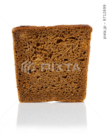 Brown bread slice isolated on white background Brown bread slice isolated on white background 9712699